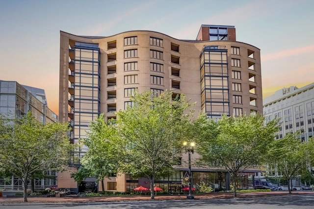 Sprawling contemporary red brick condominium complex with different levels